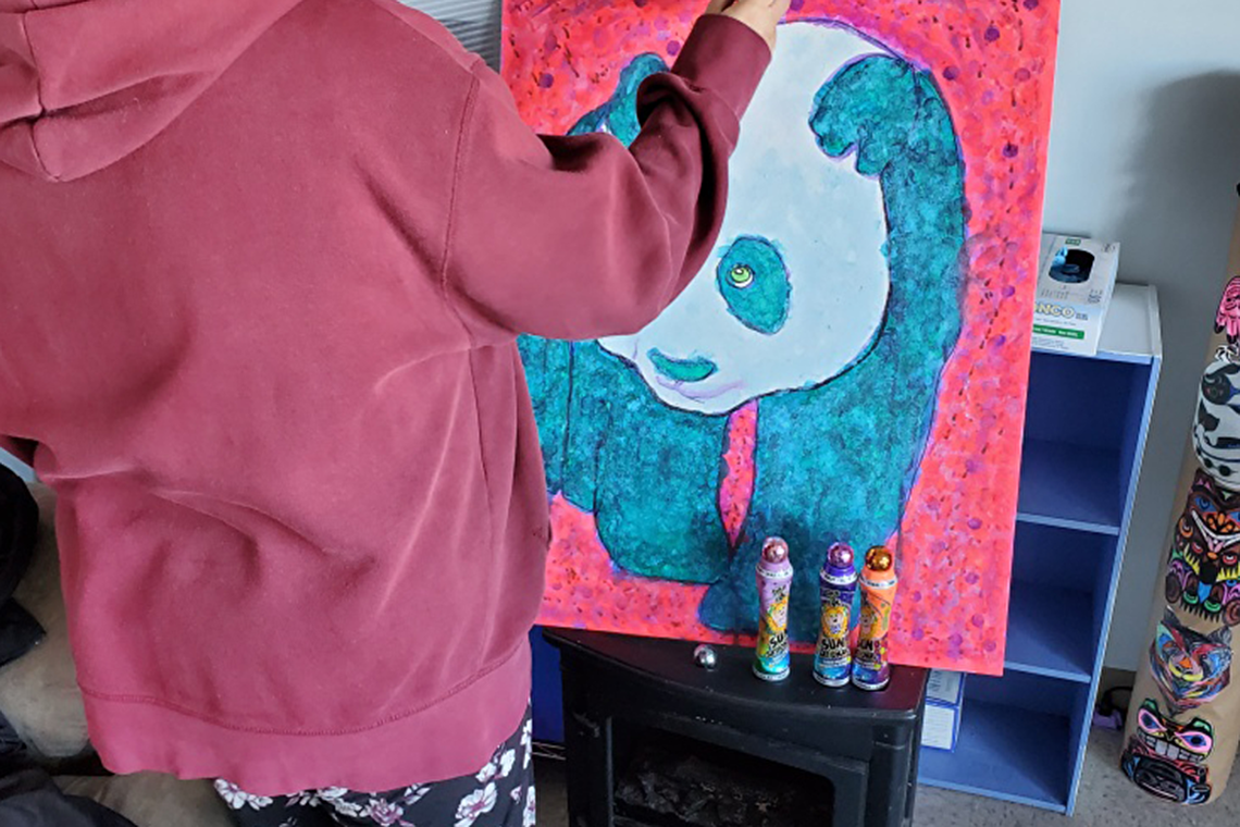 Participant drawing at Paper Crane